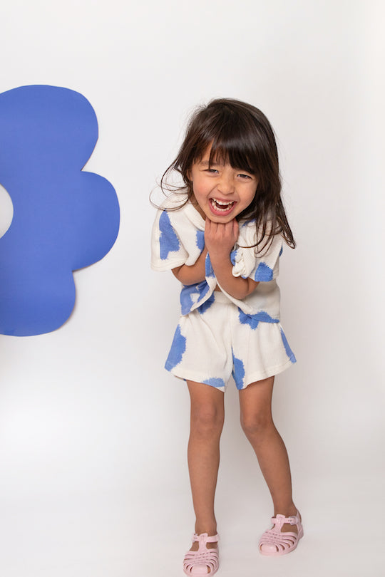 white set with blue flowers