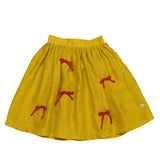 Purple Blouse-Red Buttons & Yellow Skirt